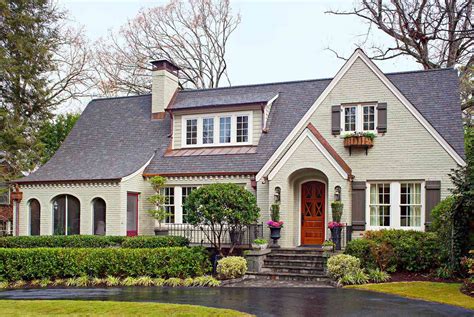 two story tudor house|two story tudor style home.